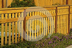 Wooden or timber front and back yard fence in suburban neighborhood downtown areas of city