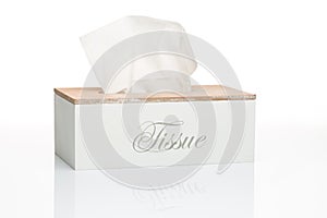 Wooden tissue box on white table