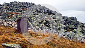 Wooden toilet in the mountains