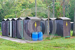 Wooden toilet or Portable toilets for male and female at National Park Thailand