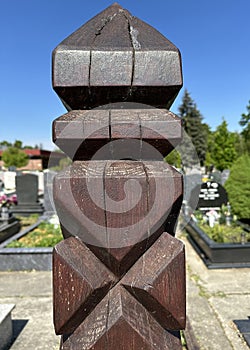 Wooden tombstone in the public cemetery