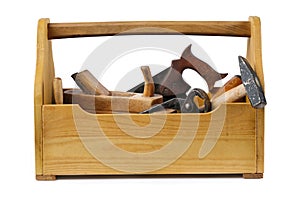 Wooden toolbox with tools isolated on white.