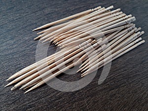 Wooden toothpic on a background selective focus