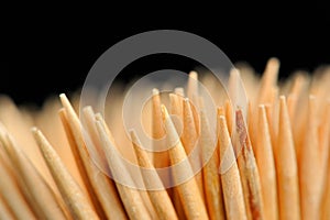 Wooden Toothpicks Close-Up on Black Background