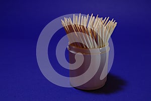 Wooden toothpicks in a container