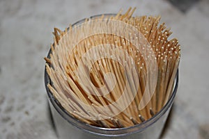 Wooden toothpicks in a plastic box