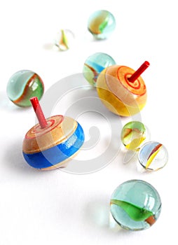 Wooden tops and marbles