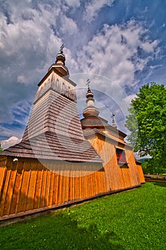 Wooden towers of Greek Catholic wooden church of St. Michael Archangel in Ladomirova