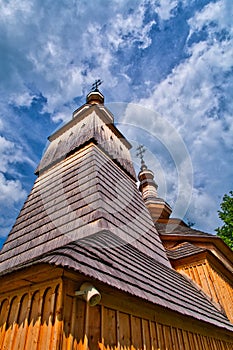 Wooden towers of Greek Catholic wooden church of St. Michael Archangel in Ladomirova