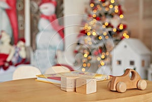 Wooden toy car and cubes, natural wood toy, shape of colored wooden, Baby toy, toys set for babies. New Year`s Christmas card
