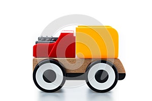 Wooden toy car on white background