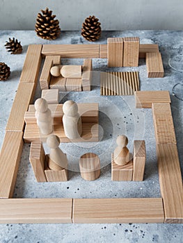 Wooden Toy Construction with ecologically wooden blocks manufactured from sustainable timbers. Wood elements for kids mental photo