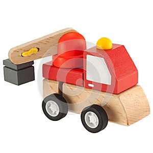 Wooden toy crane truck isolated on white