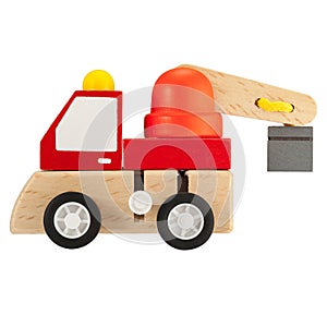 Wooden toy crane truck isolated on white