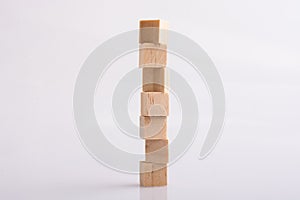 Wooden toy cubes as  educational game object on white background