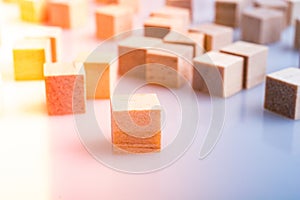 Wooden toy cubes as  educational game object on white background