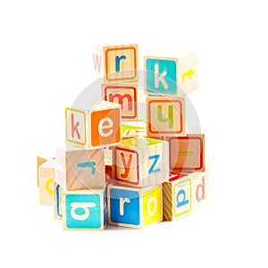 Wooden toy cubes with letters.