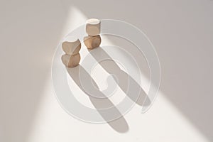 Wooden toy cubes on a light background. Business and design concept, Symbol of leadership