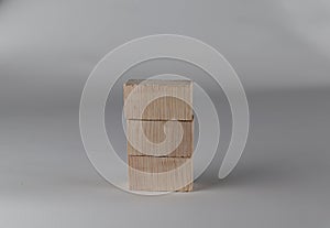 Wooden toy cubes on a white background