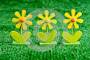 Wooden Toy Daisies on Turf