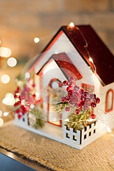 Wooden toy house and Christmas lights