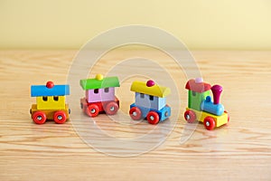 Wooden toy train with colorful blocs