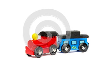 Wooden toy train with colorful blocs isolated
