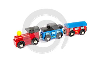 Wooden toy train with colorful blocs isolated photo