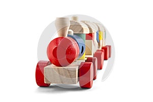 Wooden toy train with colorful blocs isolated over white with cl