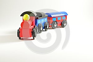 Wooden toy train with colorful blocs isolated on white background photo