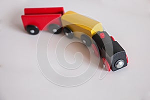 Wooden toy train with colorful blocs photo