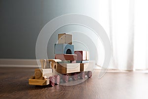 Wooden toy train on the floor