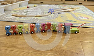 Toy Wooden toy train and ten carriages photo