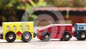 Wooden toy train move, with its wagons