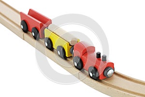 Wooden toy train on rail