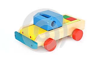 Wooden toy on a white background. Car