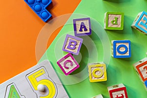 Wooden toys, blocks with abc, with numbers. Preschool, elementary school education. Development games for kids.