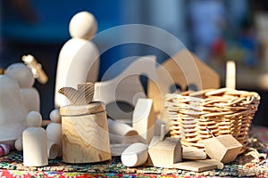 Wooden toys on wooden table. Colorful toys made from wood