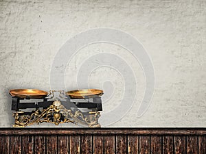 Wooden trading counter with vintage scales on a light vintage ba