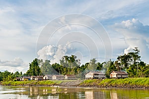 Wooden traditional house on the coast of the river Sitak-Mitak people.