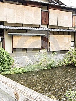 Wooden traditional houses along Shirakawa Canal in old Gion