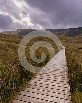 Wooden trail through beautiful countryside up a mountain. Cuilcagh Boardwalk Trail in Fermanagh