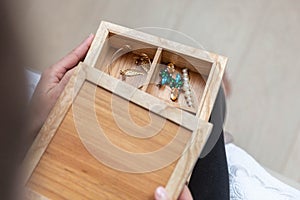 Wooden treasure box with jewellery