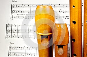 Wooden treble recorders with sheet music