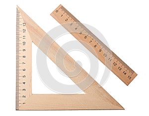 wooden triangle with wooden ruler isolated on white background. top view