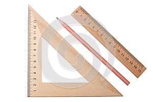 wooden triangle with wooden ruler and pencil isolated on white background. top view