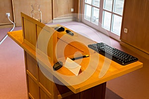 Wooden trubune in a conference or lecture hall