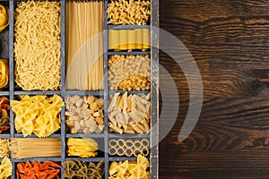 Wooden typesetter case with pasta photo