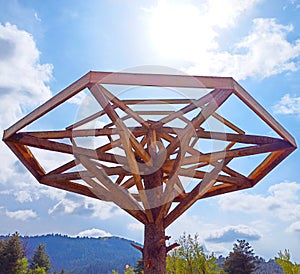 Wooden umbrella shelter of cofee shop in the sunshine