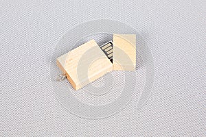 Wooden USB flash drive key storage for computer over grey background